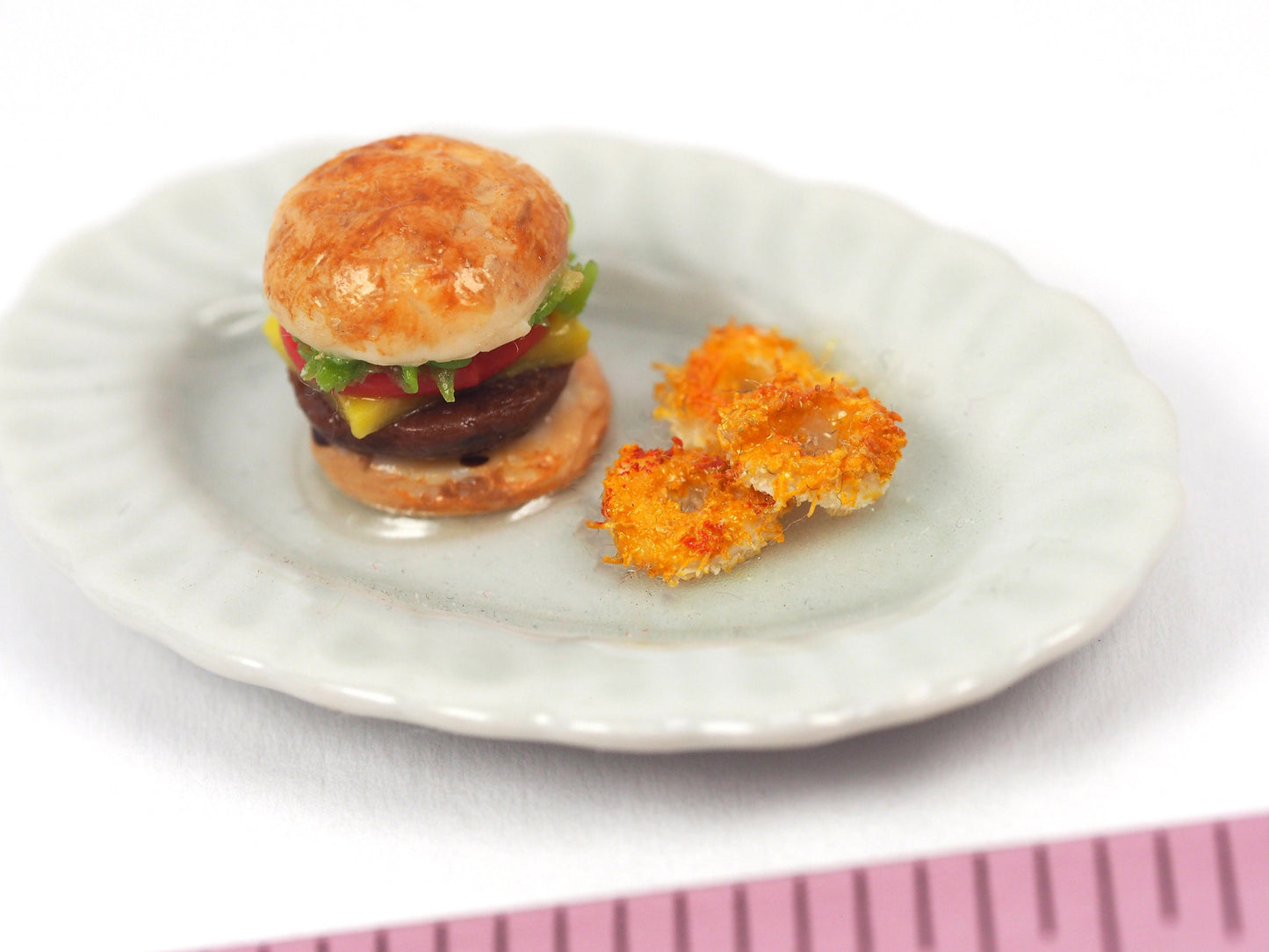 Miniature burger with fries/onion rings