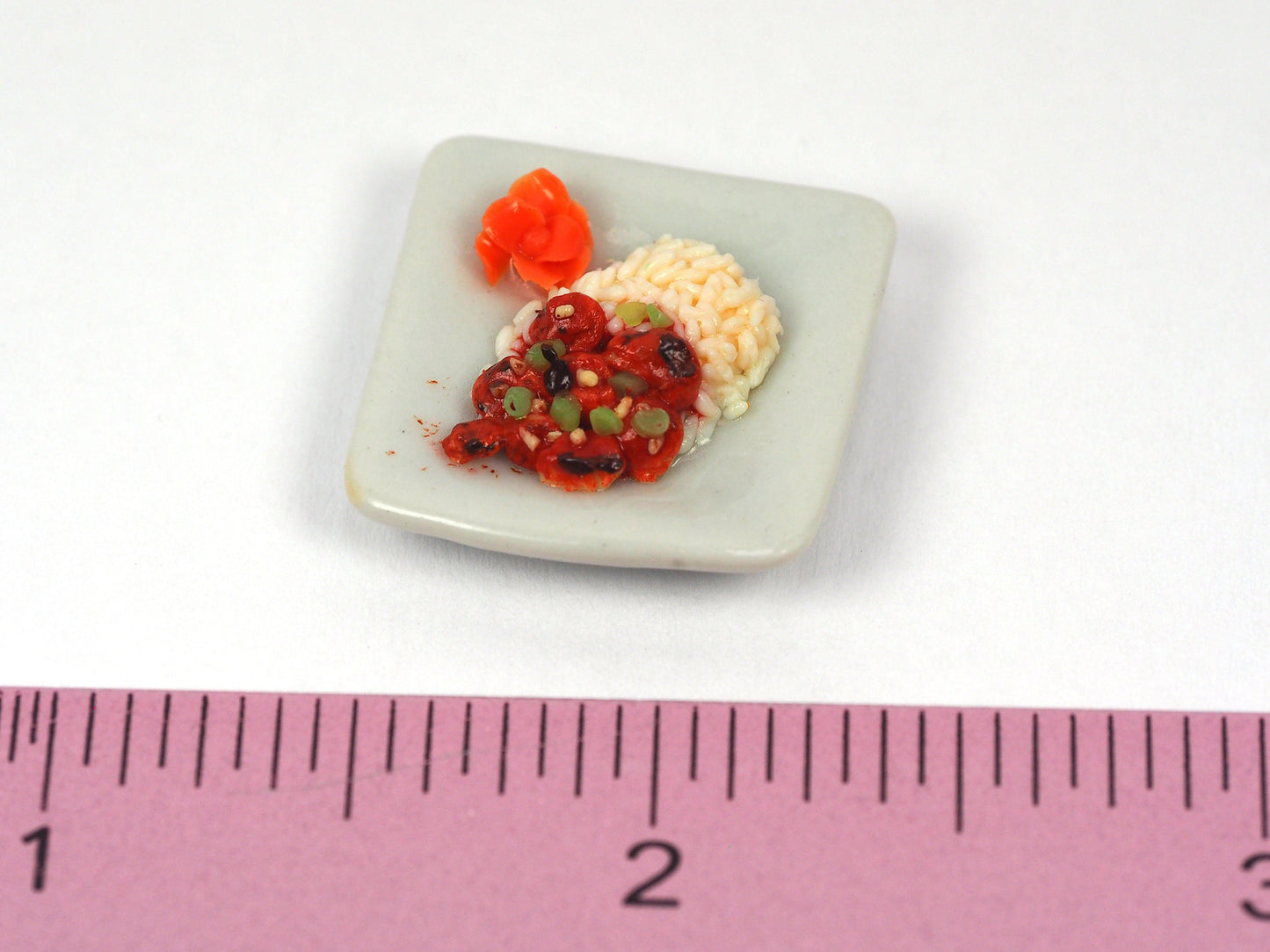 Miniature sweet and sour chicken