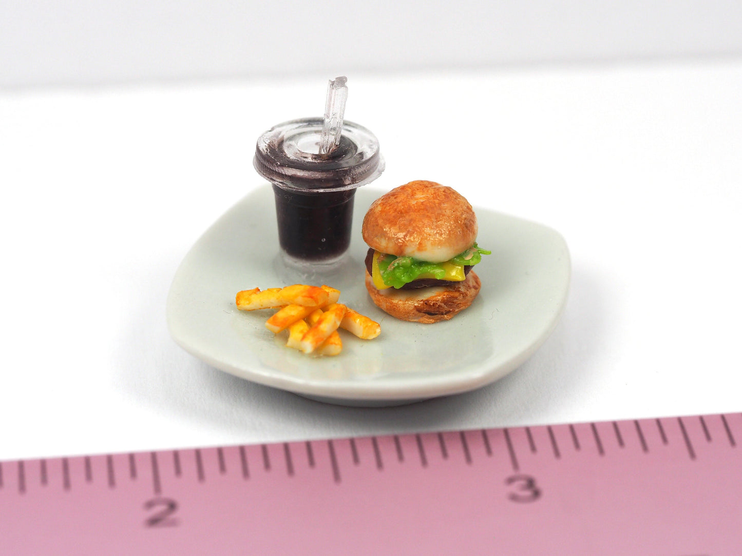Miniature burger with fries/onion rings