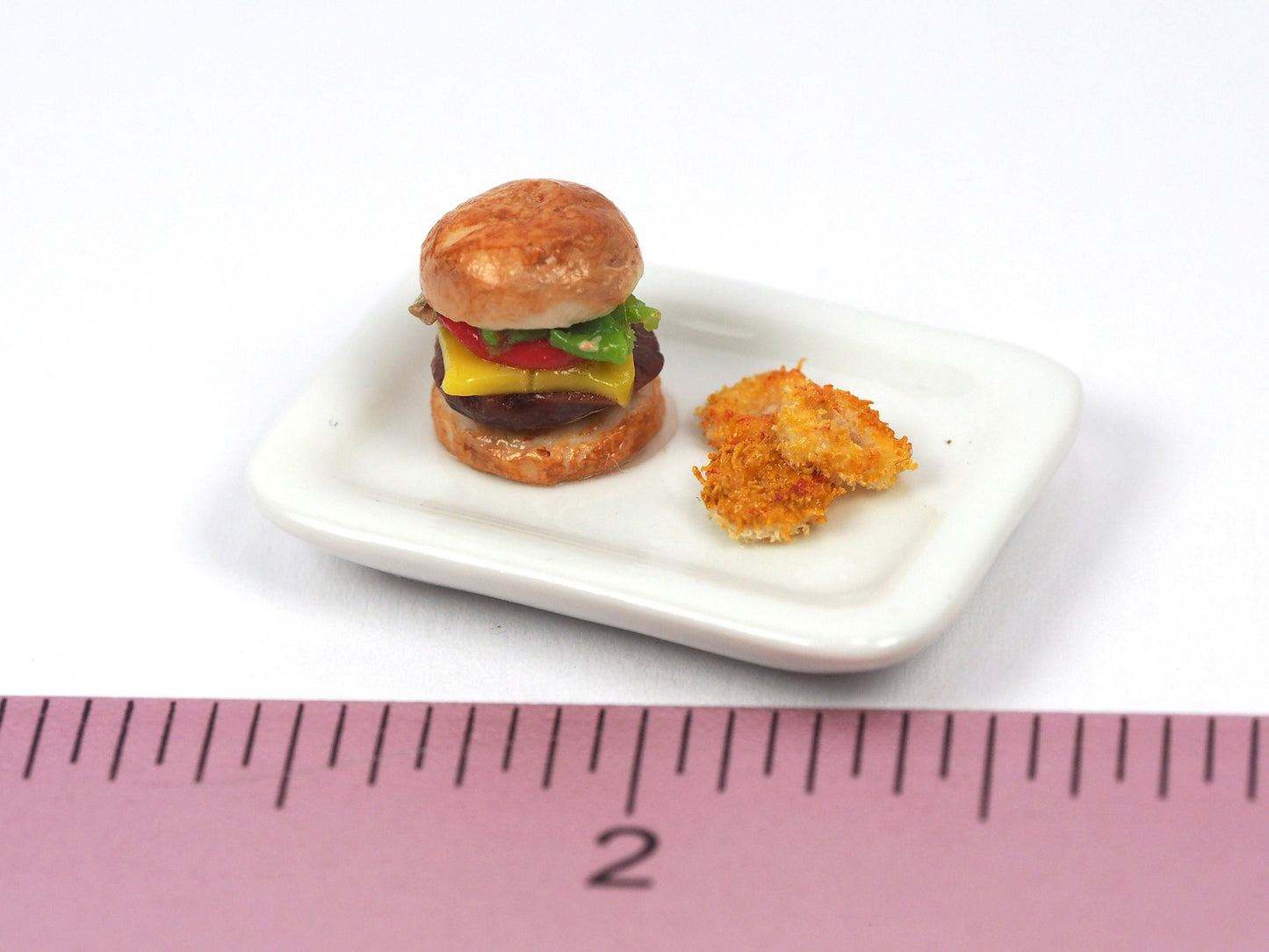 Miniature burger with fries/onion rings