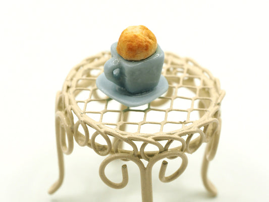 Miniature muffin in a mug